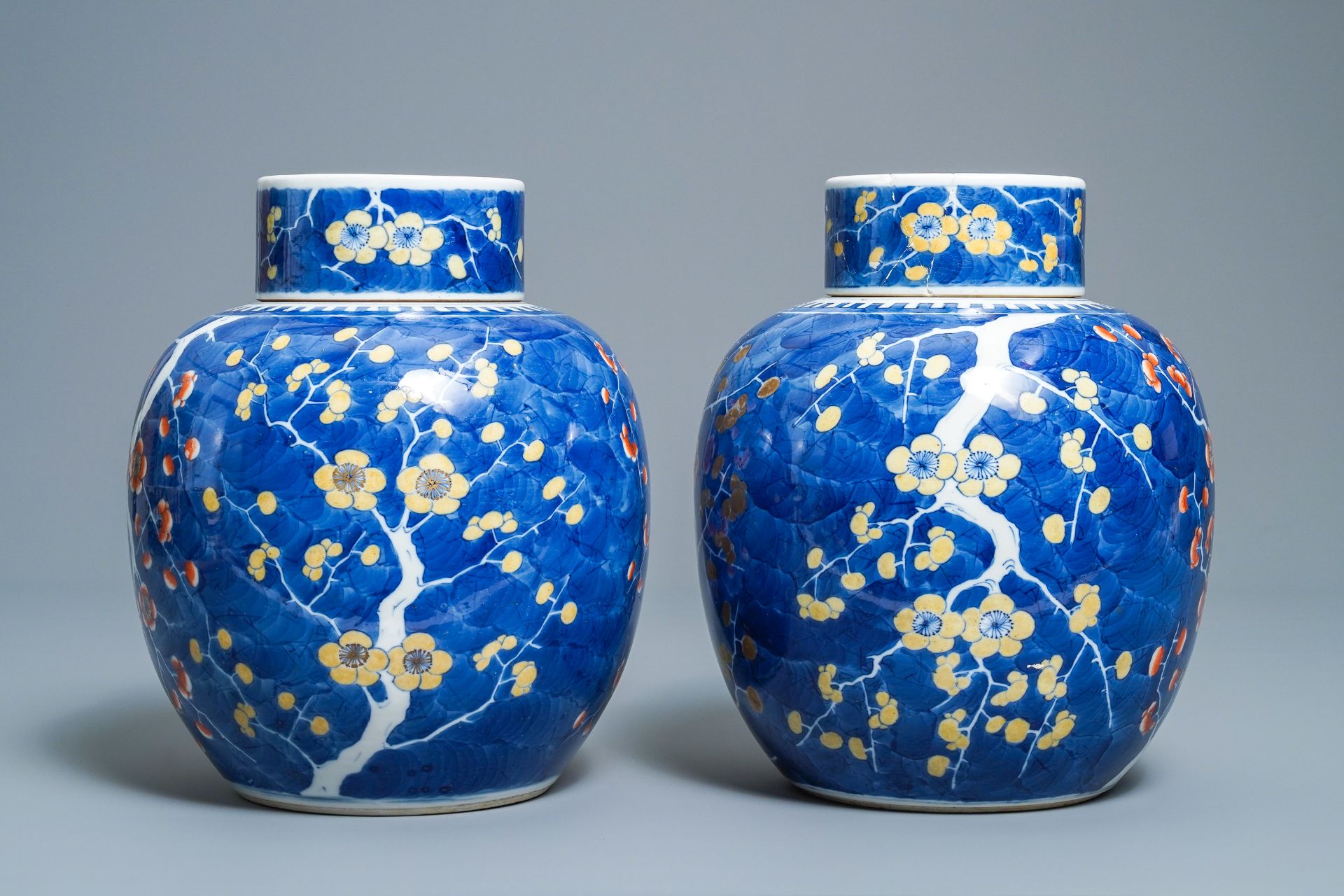 A pair of Chinese polychrome 'prunus on cracked ice' jars and covers, 19th C. - Image 3 of 9