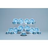 Eleven Chinese blue and white lobed cups and saucers, Kangxi