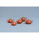 Five Chinese Yixing stoneware teapots and covers, 19th C.