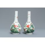 A pair of Chinese famille rose bottle vases, 19th C.