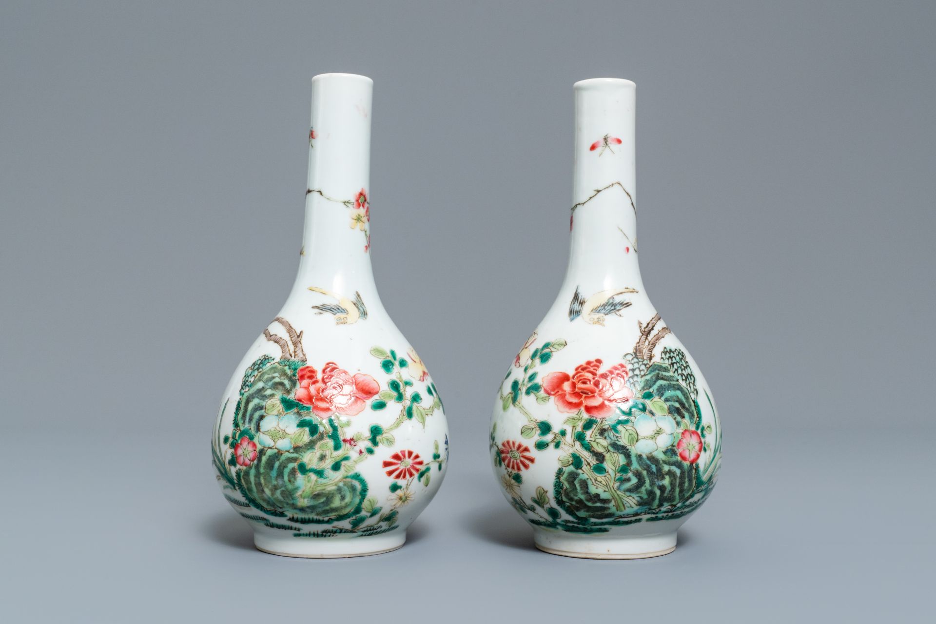 A pair of Chinese famille rose bottle vases, 19th C.