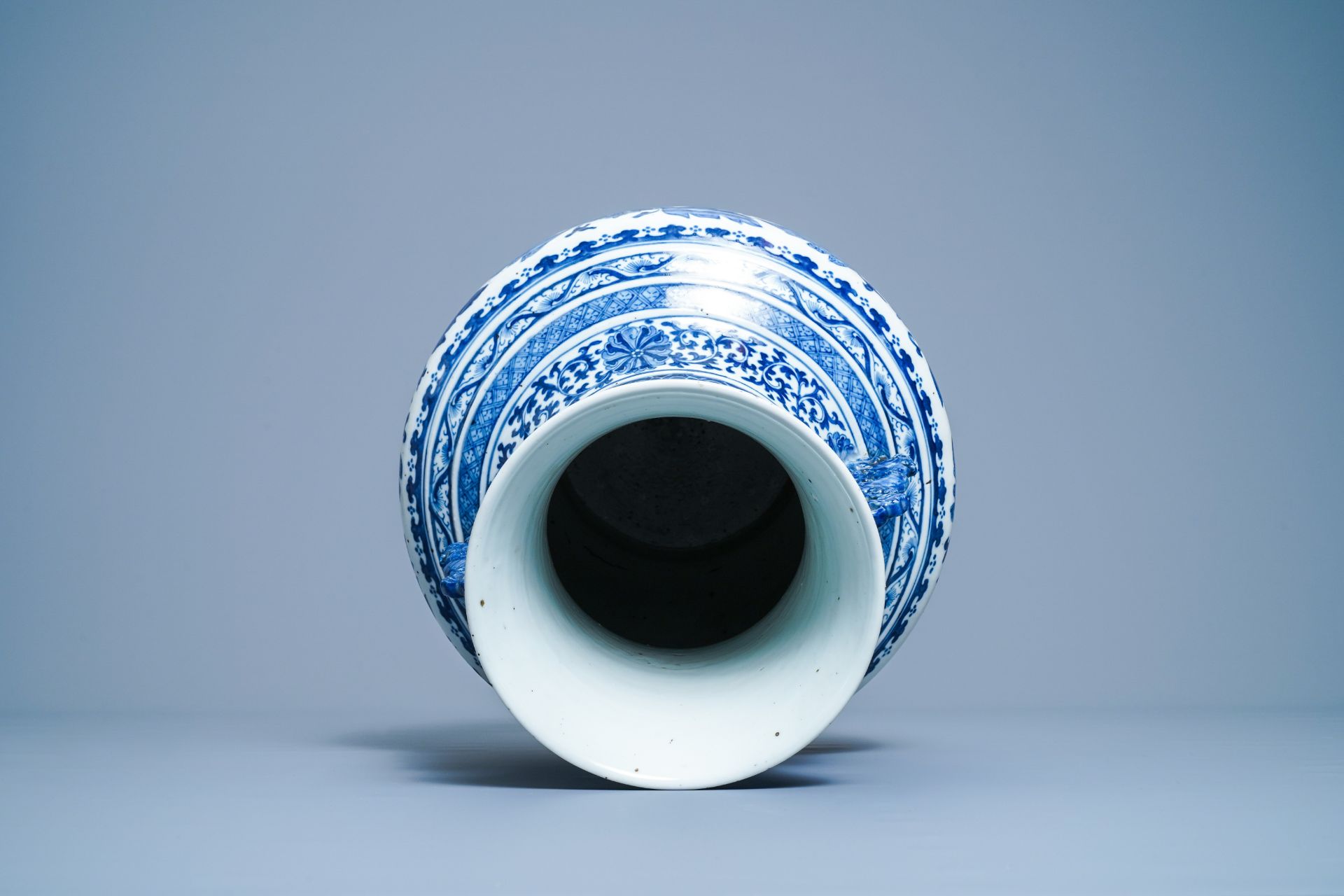 A Chinese blue and white 'hu' vase with floral design, Qianlong mark, 19th C. - Image 5 of 10