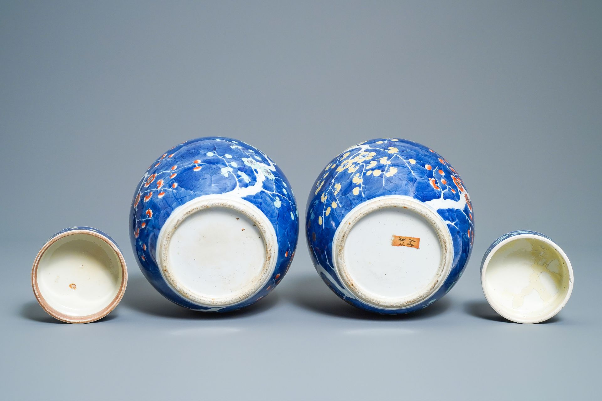 A pair of Chinese polychrome 'prunus on cracked ice' jars and covers, 19th C. - Image 6 of 9