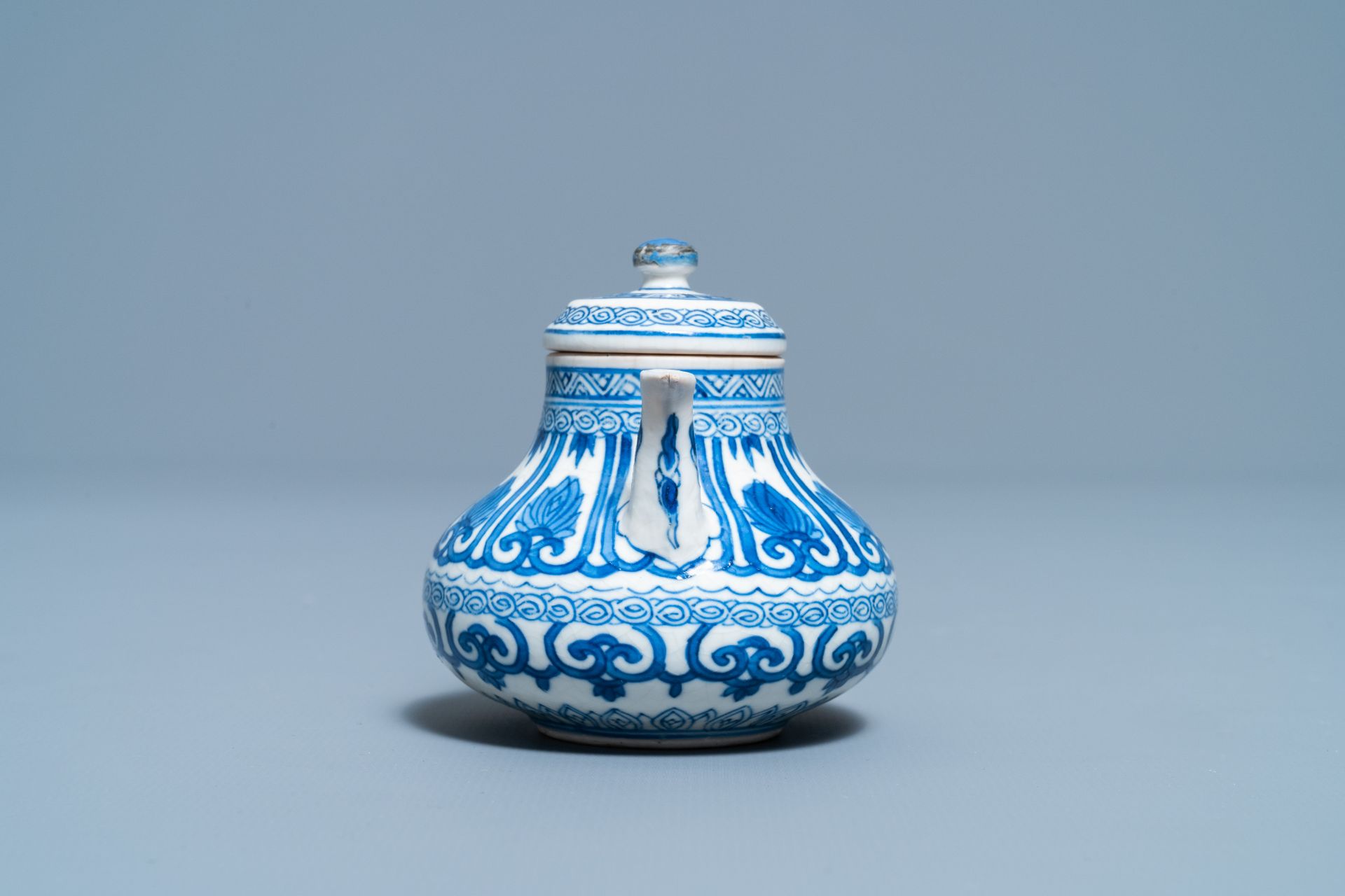 A Chinese blue and white soft paste miniature teapot, Kangxi - Image 5 of 7