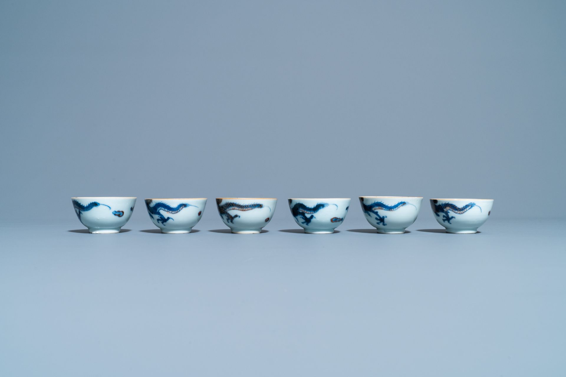 Six Chinese doucai 'dragon' cups and saucers, Kangxi - Image 7 of 11