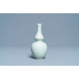 A Chinese monochrome celadon double gourd vase, Kangxi