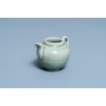 A Chinese monochrome celadon-glazed teapot, Ming