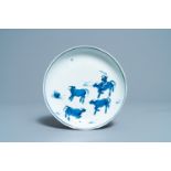 A Chinese blue and white ko-sometsuke 'oxen' plate for the Japanese market, Tianqi