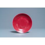 A Chinese monochrome ruby red plate, Jiaqing mark and of the period