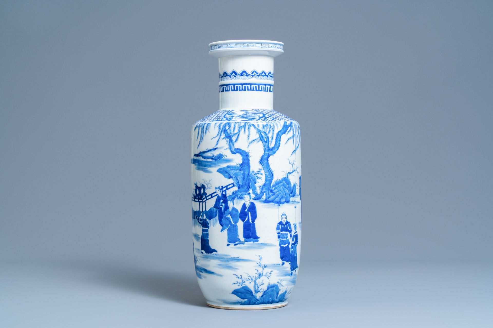 A Chinese blue and white rouleau vase, Kangxi mark, 19/20th C.