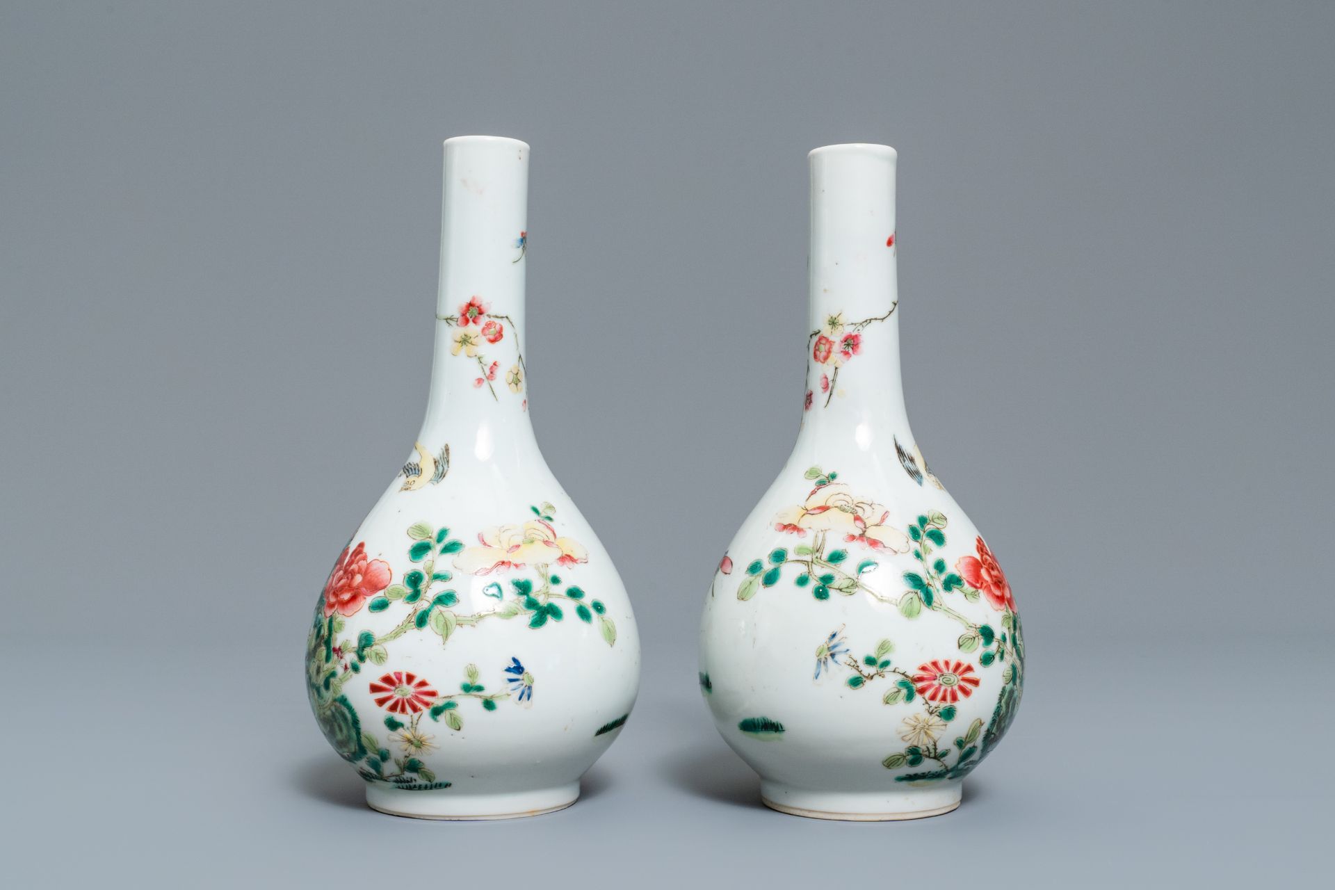 A pair of Chinese famille rose bottle vases, 19th C. - Image 2 of 10