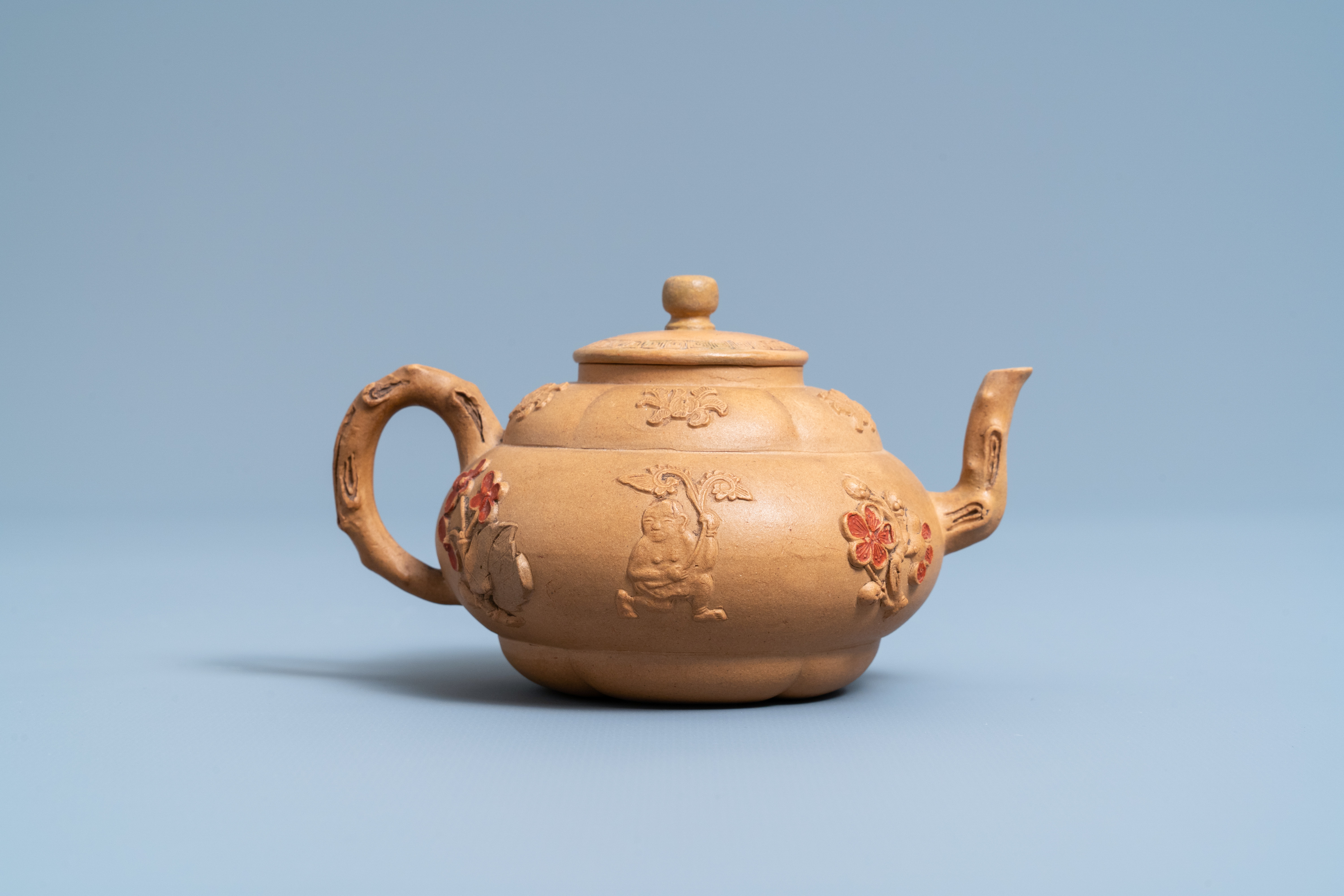 A bichrome Chinese Yixing stoneware teapot and cover with applied design, Kangxi - Image 4 of 7