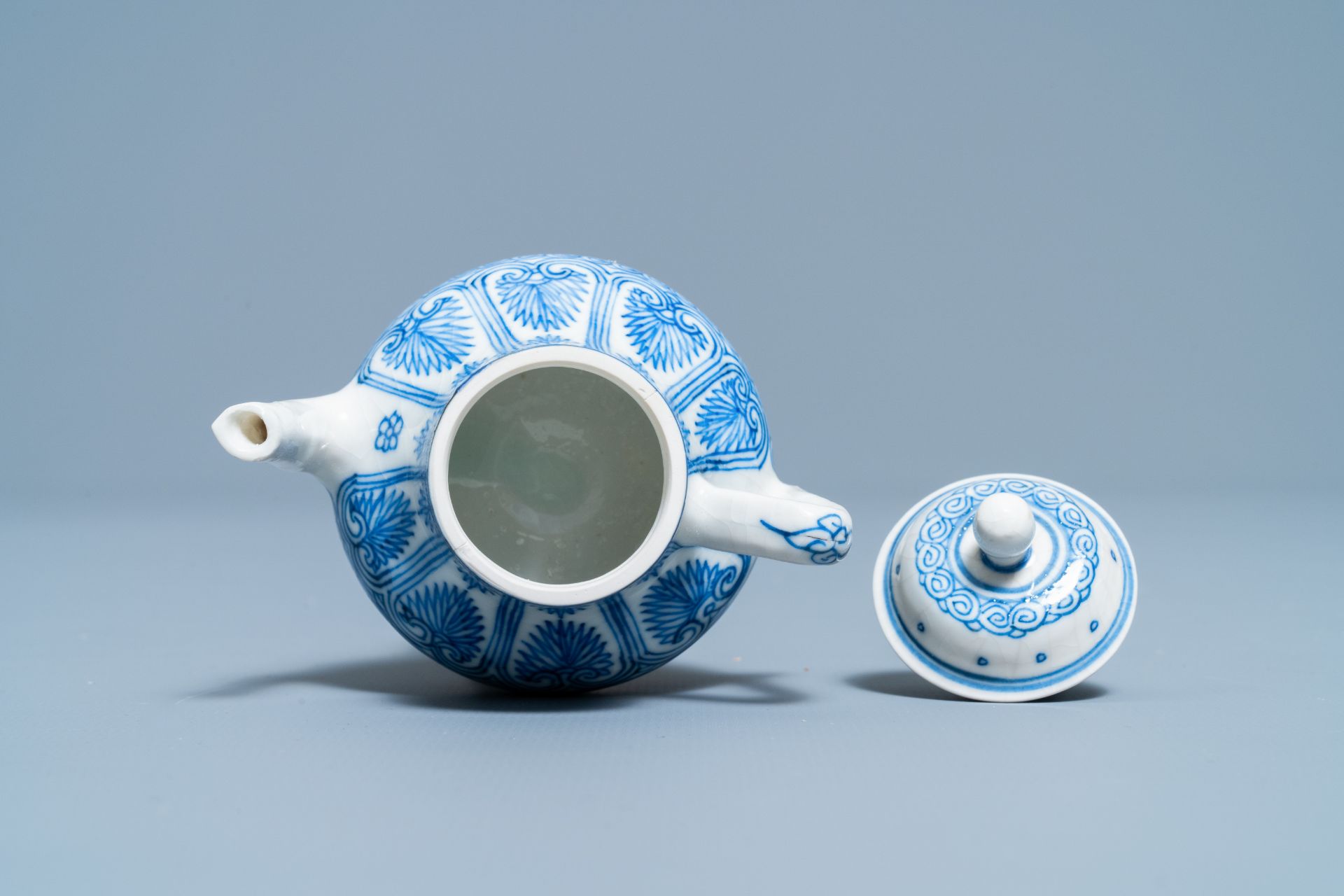 A Chinese blue and white soft paste miniature teapot, Kangxi - Image 7 of 7