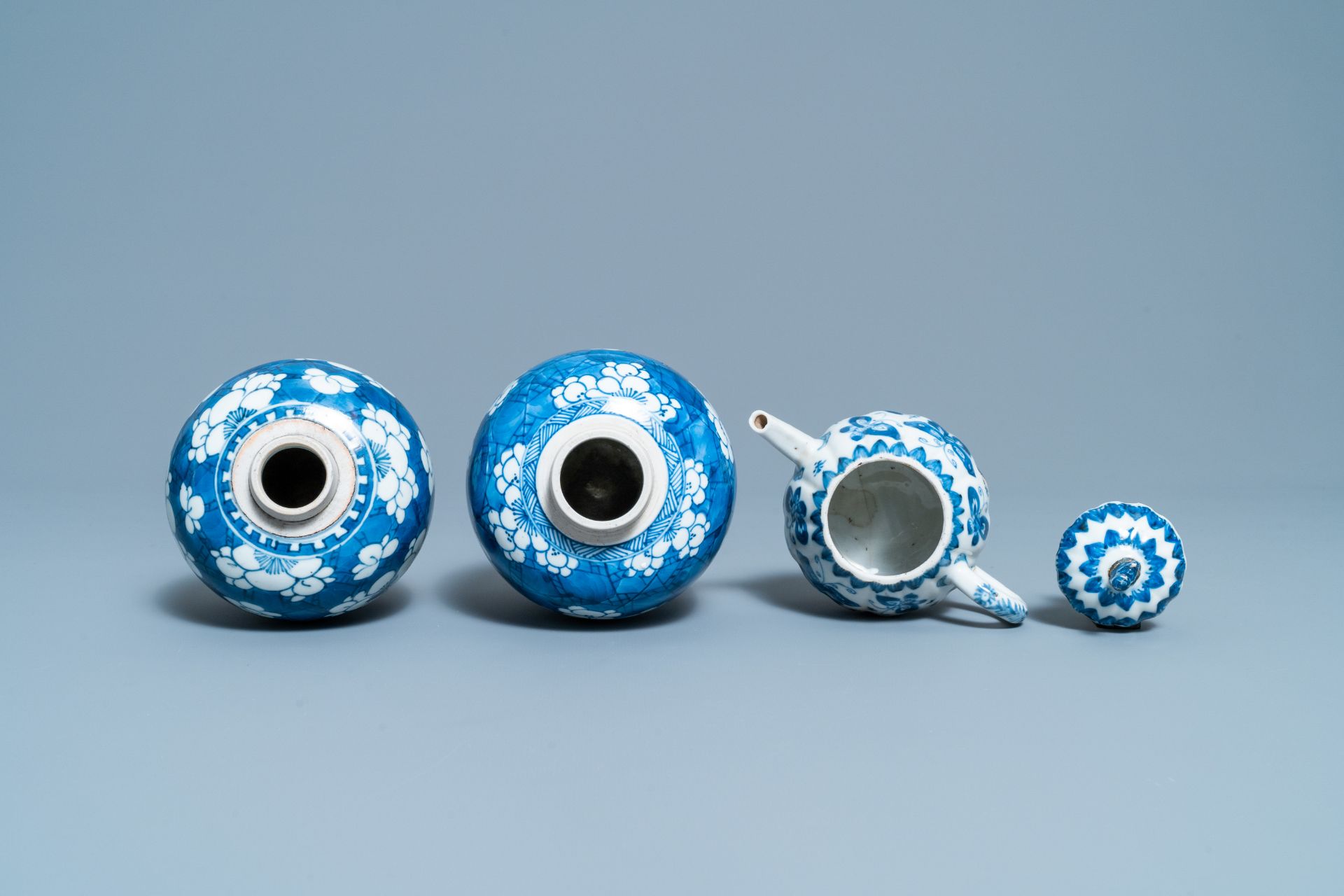 A pair of Chinese blue & white 'prunus' jars & a 'butterfly' teapot & cover, Kangxi - Image 7 of 8