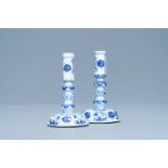 A pair of Chinese blue and white candlesticks, Kangxi