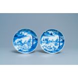 A pair of Chinese blue and white plates with a narrative scene, Kangxi/Yongzheng