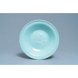 A Chinese celadon 'dragon' dish, 19th C.