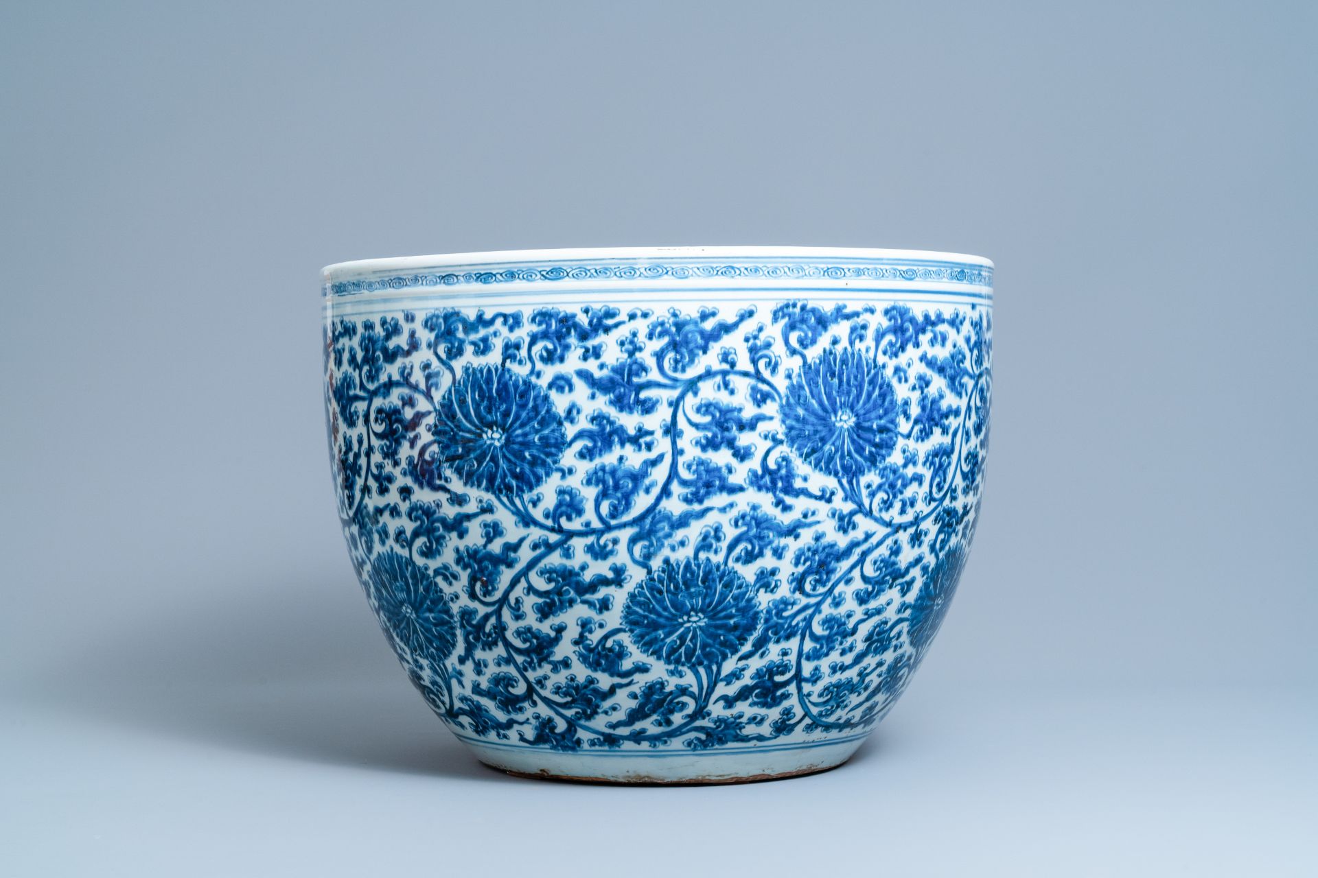 An exceptionally large Chinese blue and white 'lotus scroll' fish bowl, Kangxi - Image 2 of 7