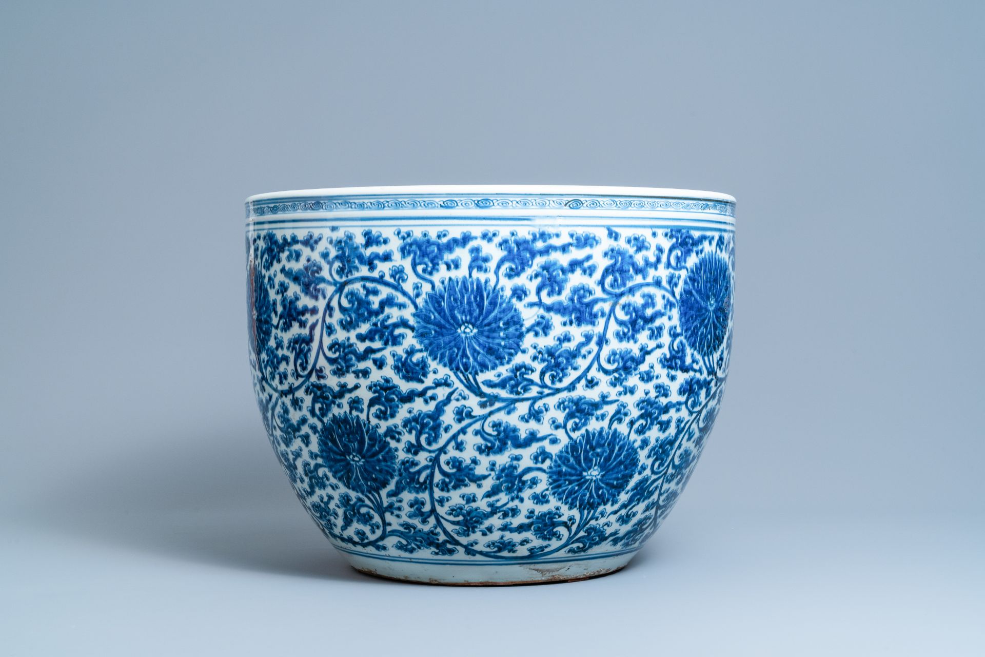 An exceptionally large Chinese blue and white 'lotus scroll' fish bowl, Kangxi - Image 5 of 7
