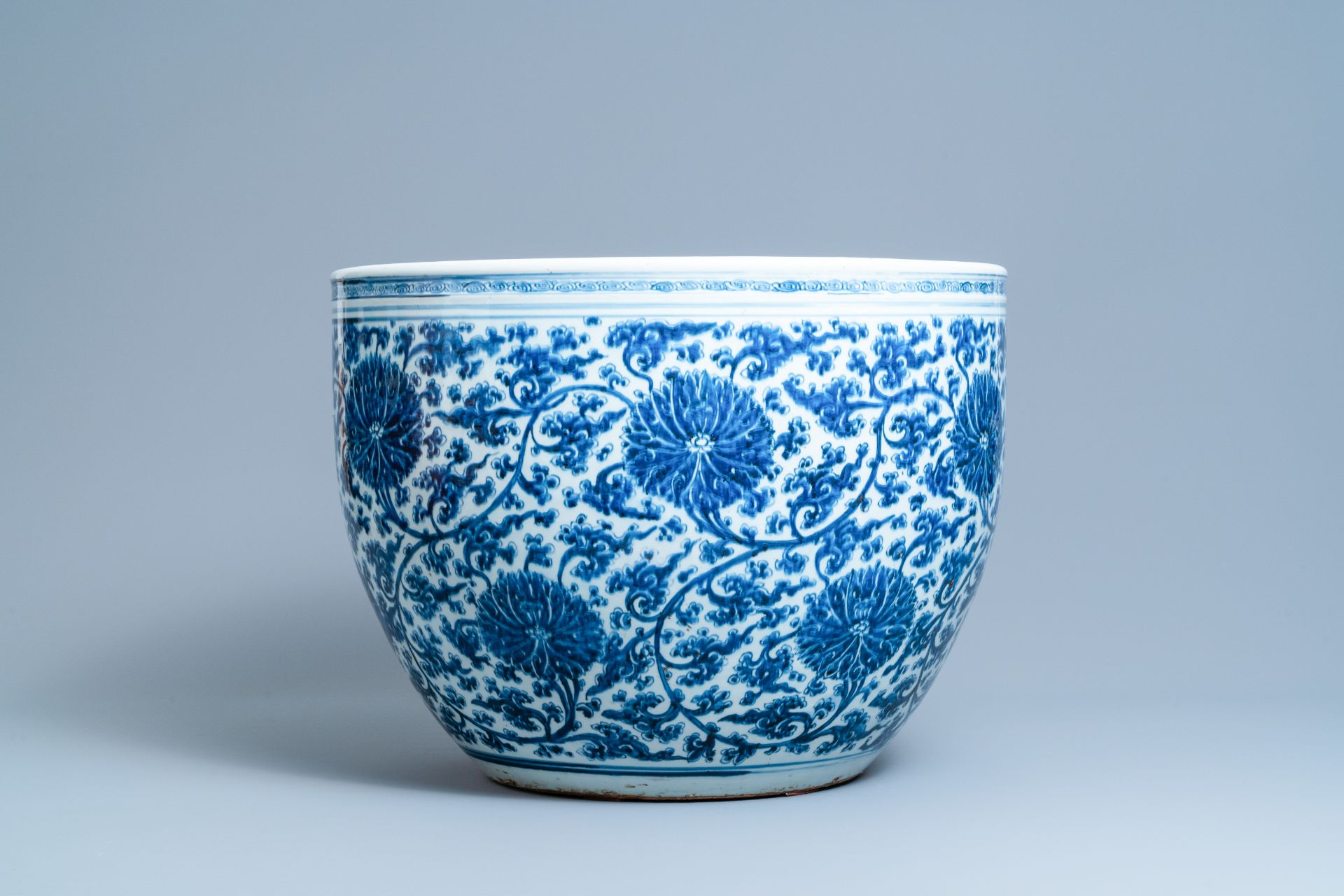 An exceptionally large Chinese blue and white 'lotus scroll' fish bowl, Kangxi - Image 3 of 7