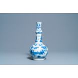 A Chinese blue and white bottle vase with figures in a landscape, Transitional period