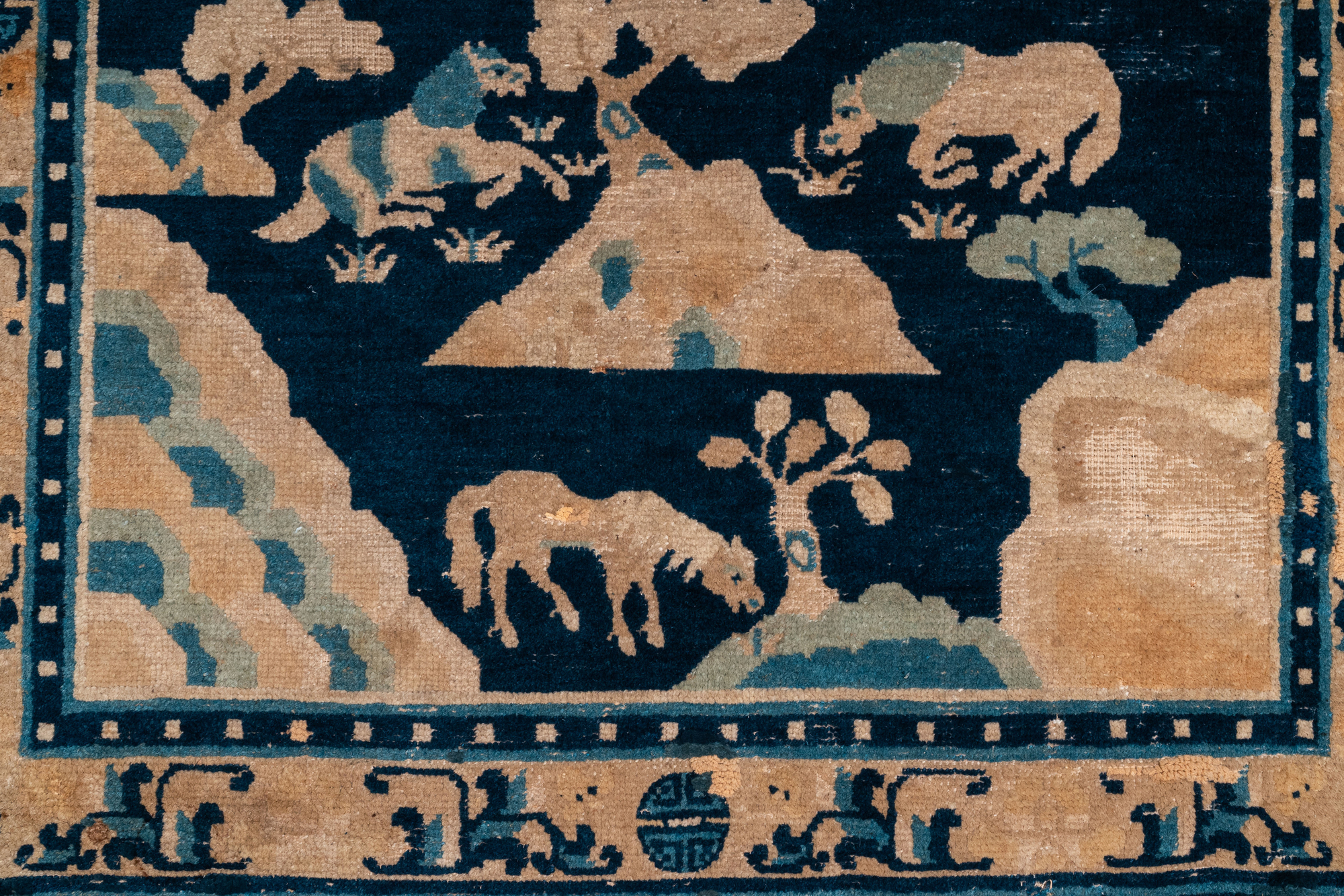 A large Chinese rectangular 'Eight horses of Mu Wang' carpet, 19th C. - Image 3 of 5