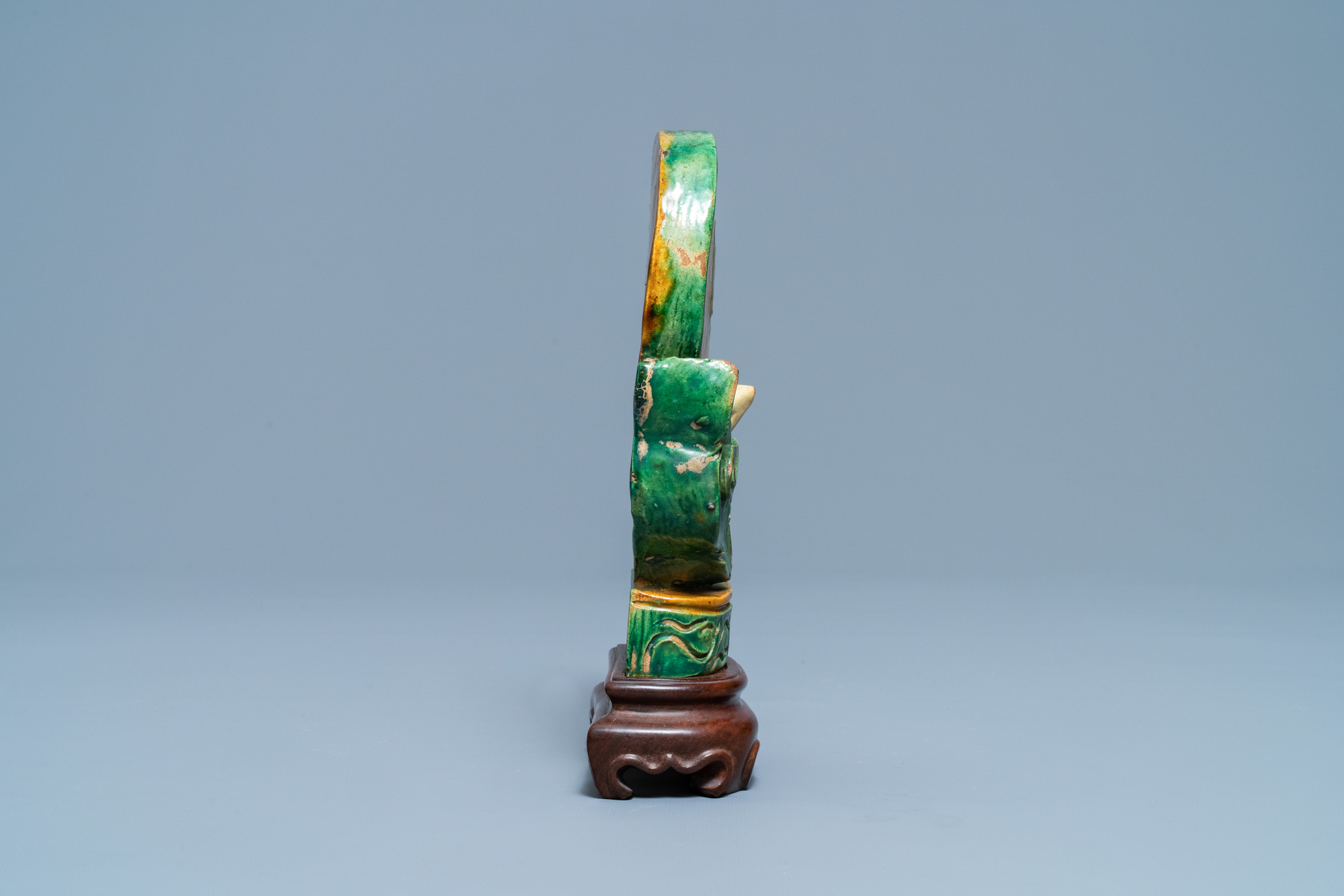 A Chinese sancai-glazed Buddhist emblem on wooden stand, Ming - Image 3 of 7