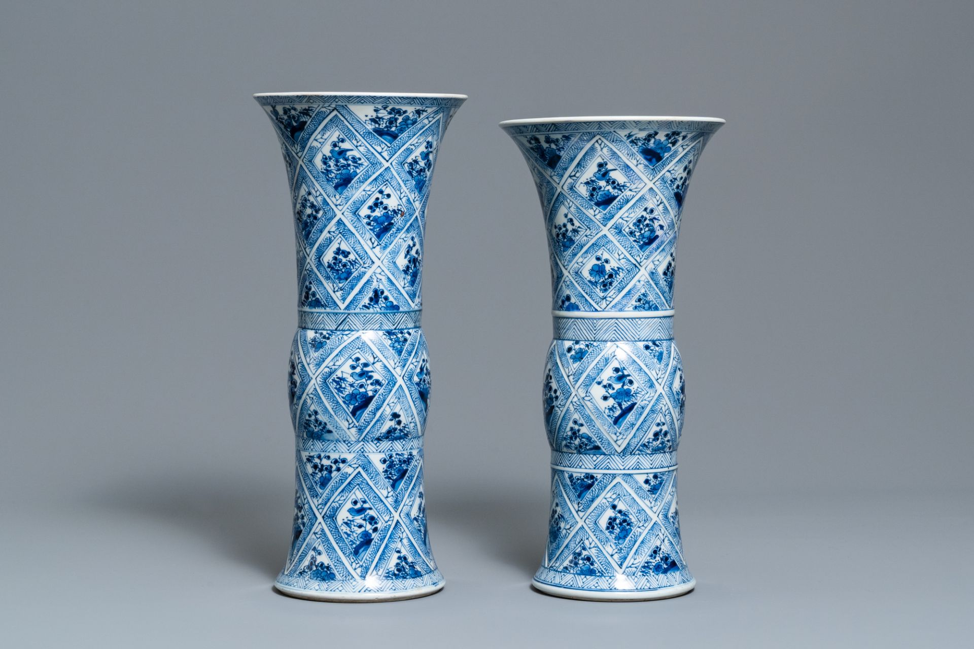 A large Chinese blue and white five-piece garniture with floral and landscape panels, Kangxi - Image 10 of 66