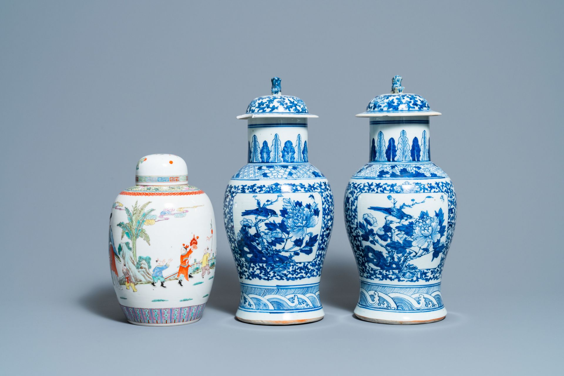 A pair of Chinese blue and white vases and a famille rose jar and cover, 19/20th C. - Image 4 of 9