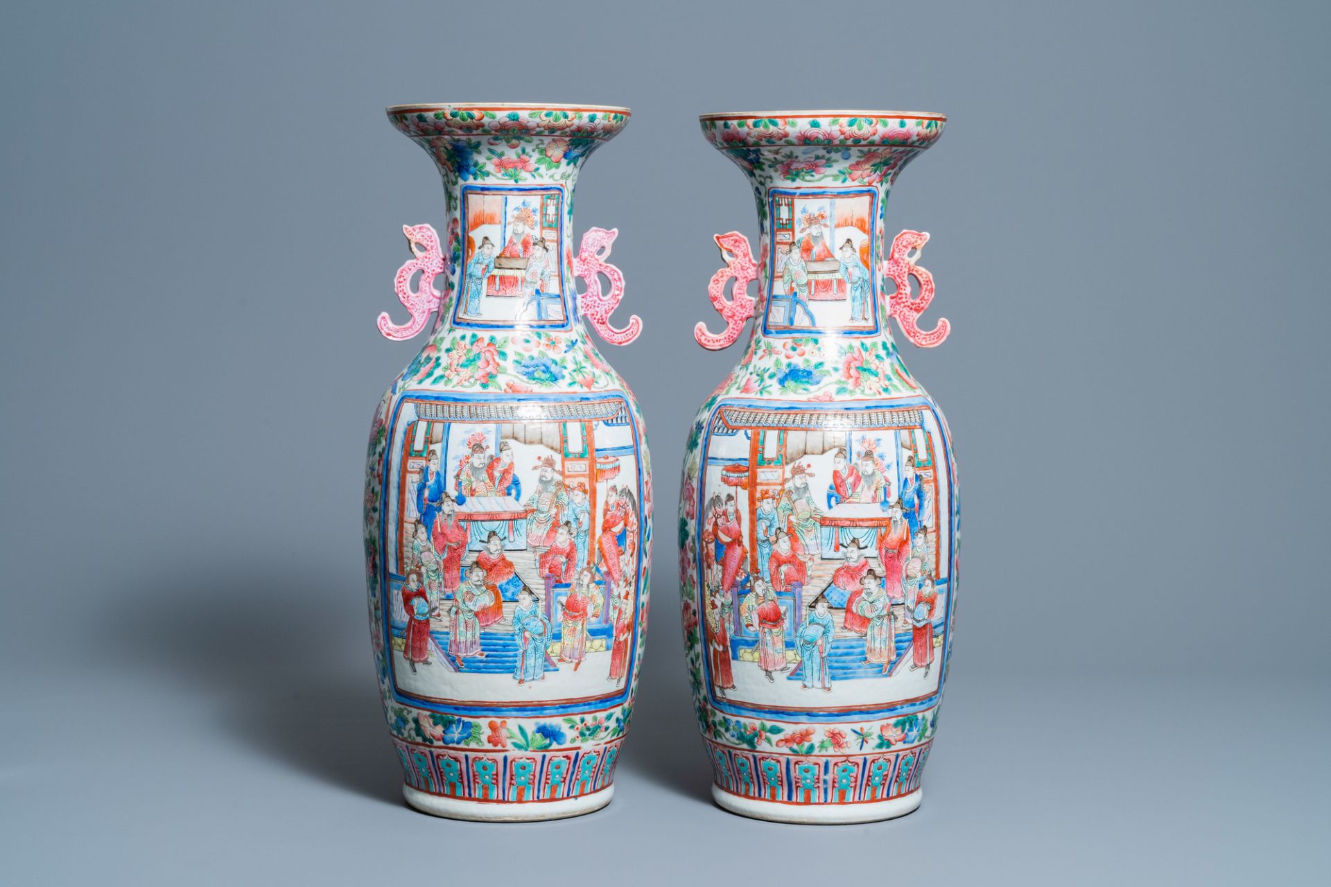 A pair of Chinese famille rose 'court scene' vases, 19th C. - Image 3 of 6