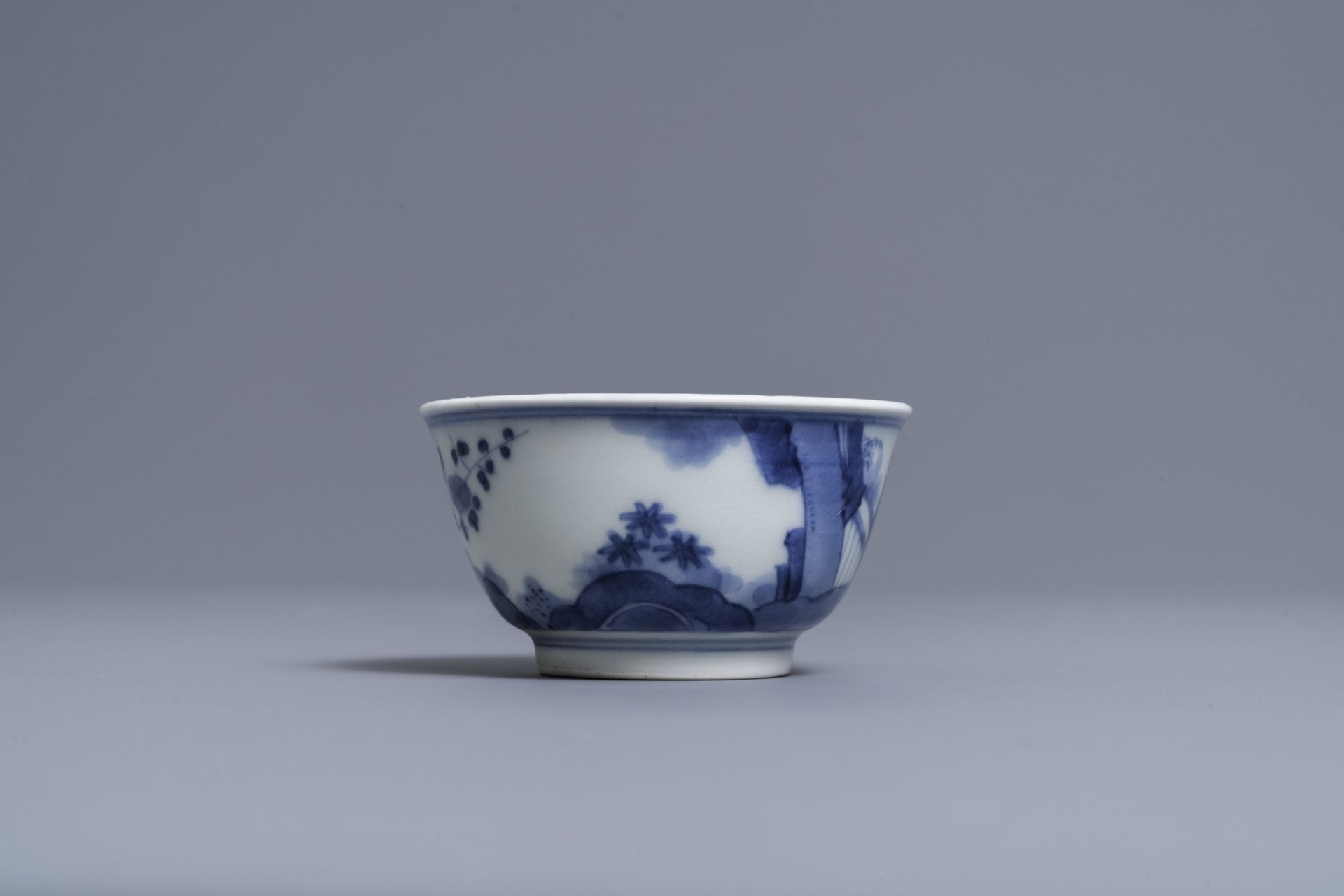 Two Japanese blue and white Arita plates and a cup and saucer, Edo, 17/18th C. - Image 8 of 11