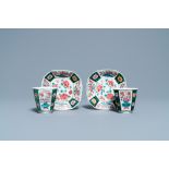 A pair of Chinese octagonal famille rose cups and saucers, Qianlong