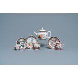 A Chinese famille rose teapot and three cups and saucers, Yongzheng/Qianlong