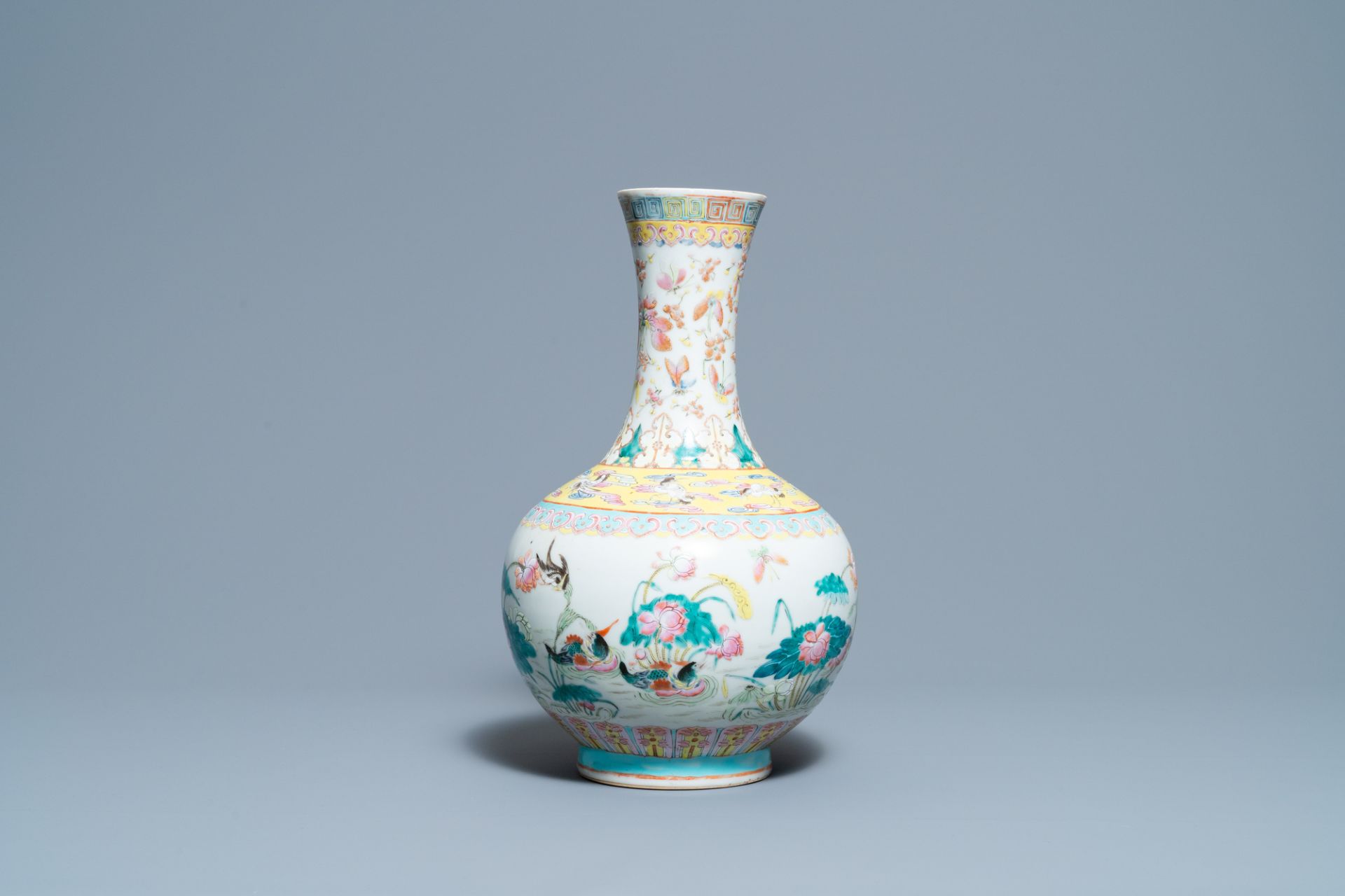 A Chinese famille rose bottle vase with mandarin ducks in a lotus pond, 19th C. - Image 4 of 6