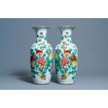 A pair of Chinese famille rose vases with fruits and flowers, 19/20th C.