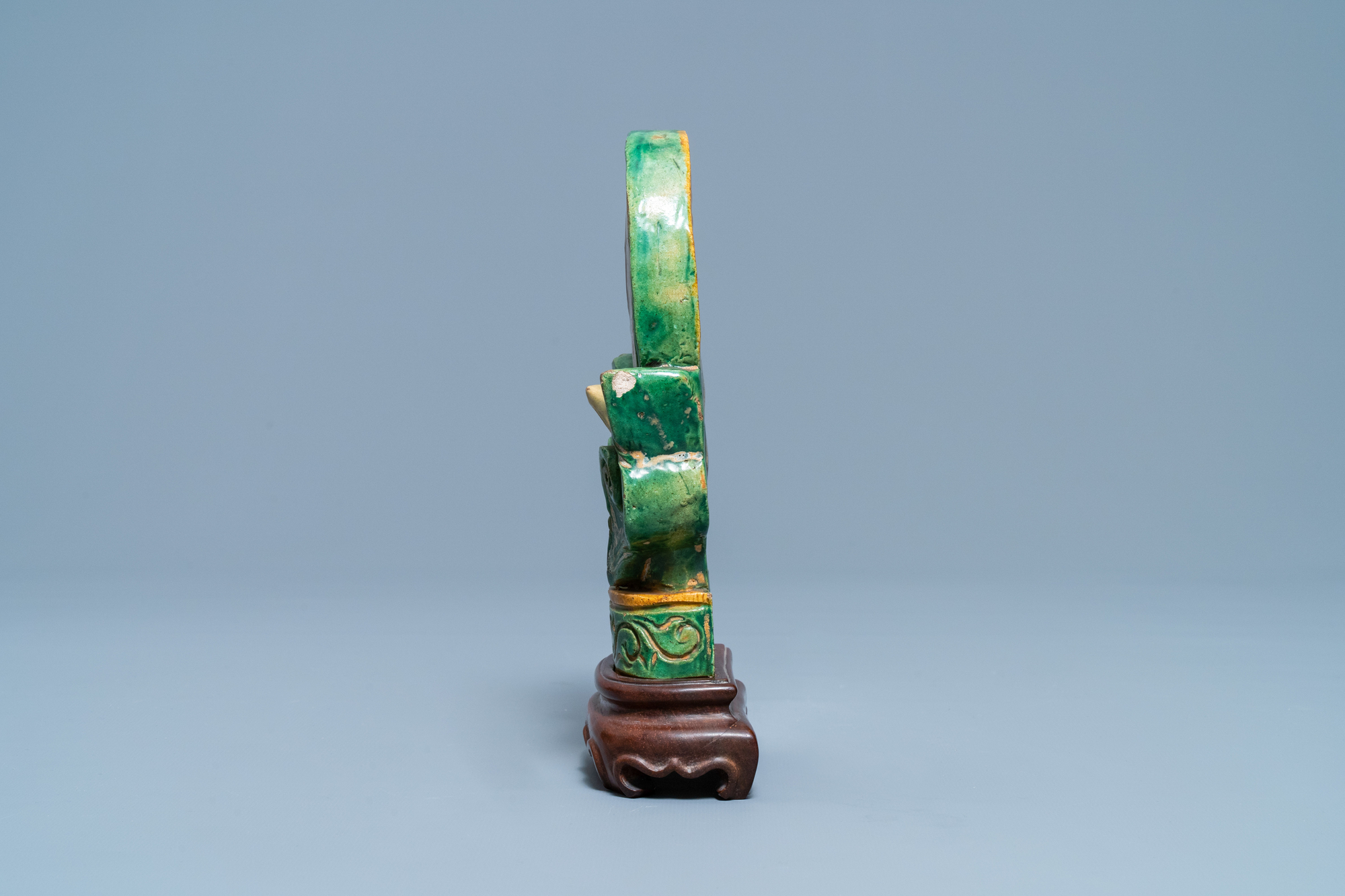 A Chinese sancai-glazed Buddhist emblem on wooden stand, Ming - Image 5 of 7