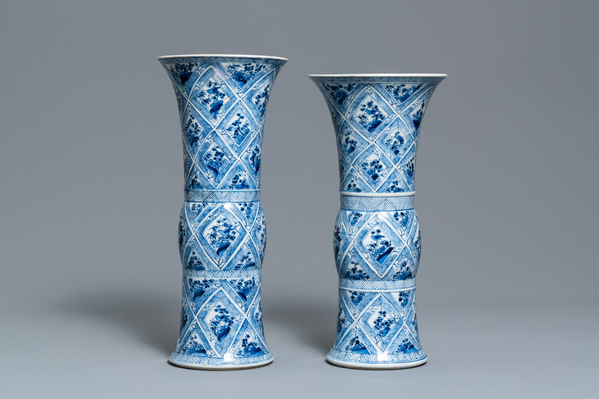 A large Chinese blue and white five-piece garniture with floral and landscape panels, Kangxi - Image 13 of 66