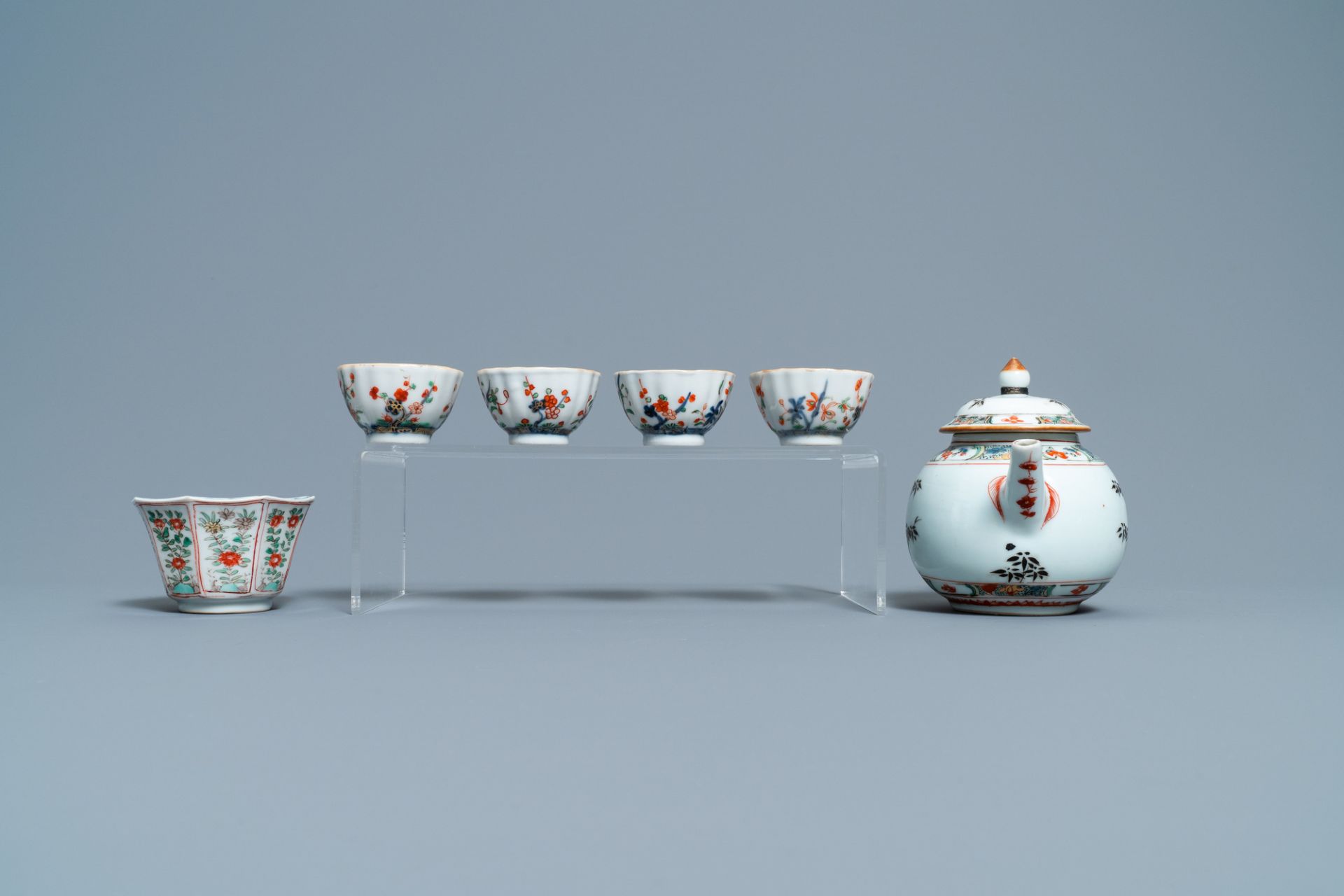 A Chinese famille verte teapot, seven saucers and five cups, Kangxi - Image 7 of 9