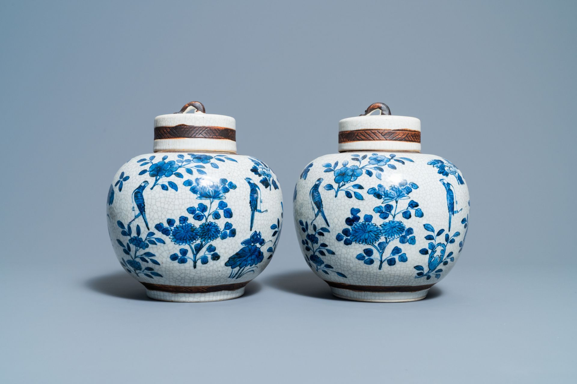 A pair of Chinese blue and white Nanking crackle-glazed jars and covers, 19th C. - Image 3 of 6