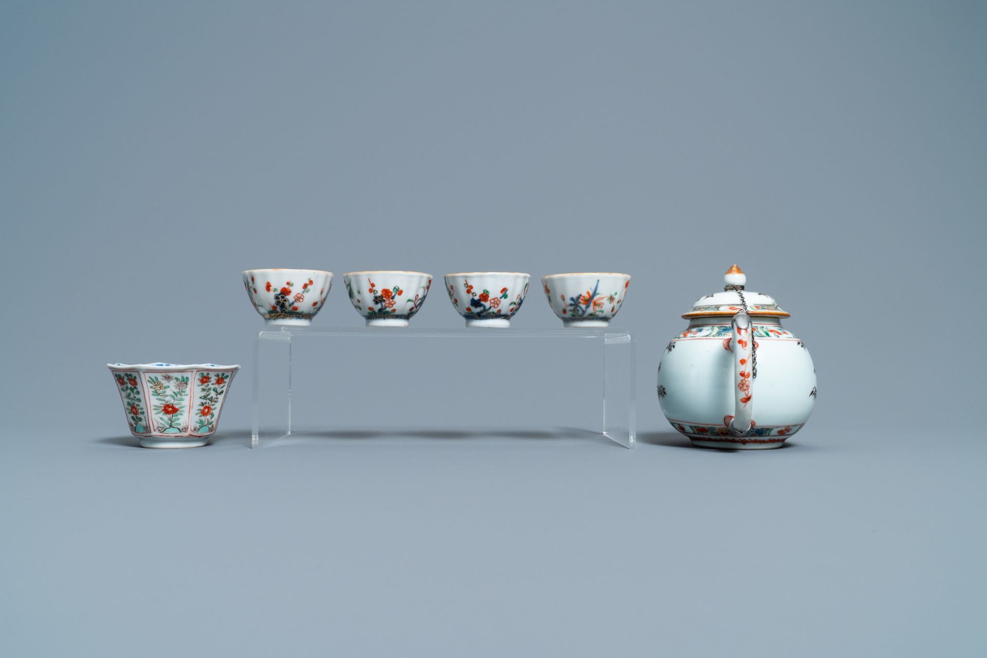 A Chinese famille verte teapot, seven saucers and five cups, Kangxi - Image 5 of 9