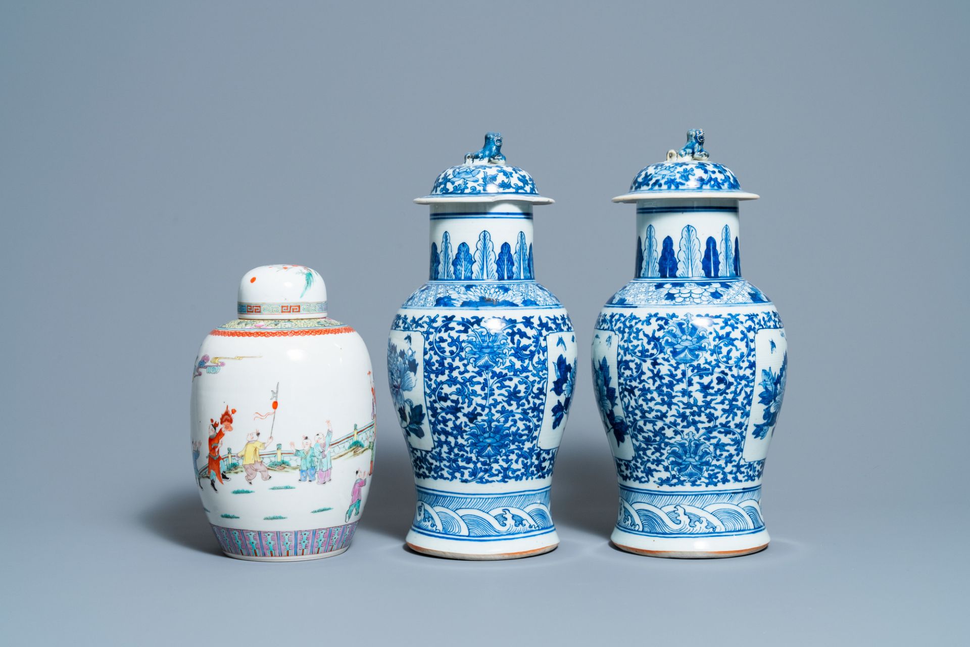 A pair of Chinese blue and white vases and a famille rose jar and cover, 19/20th C. - Image 5 of 9