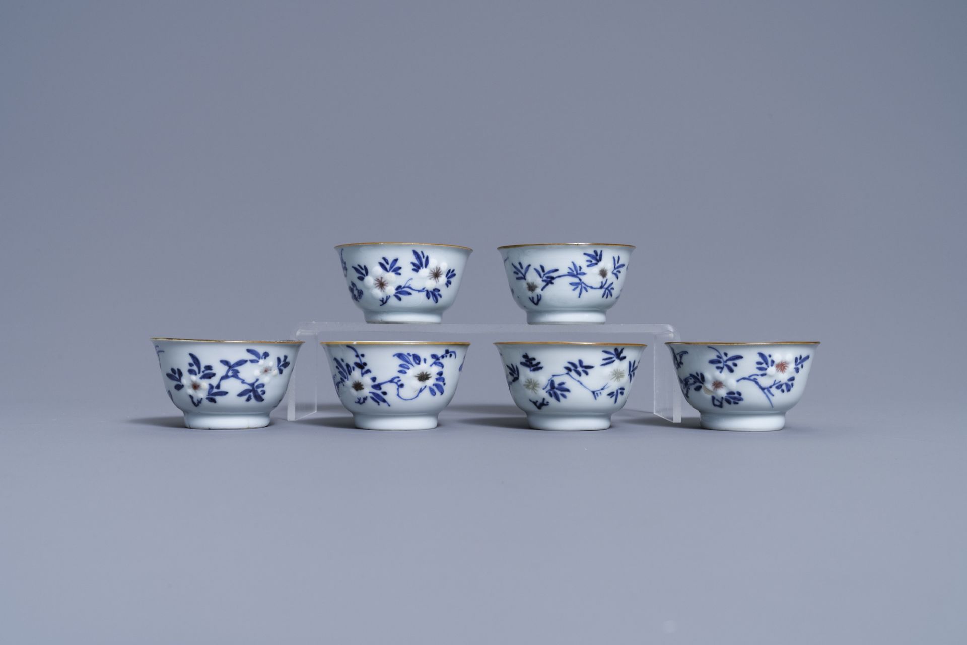 Six Chinese blue, white and copper-red cups and saucers, Kangxi - Image 5 of 9