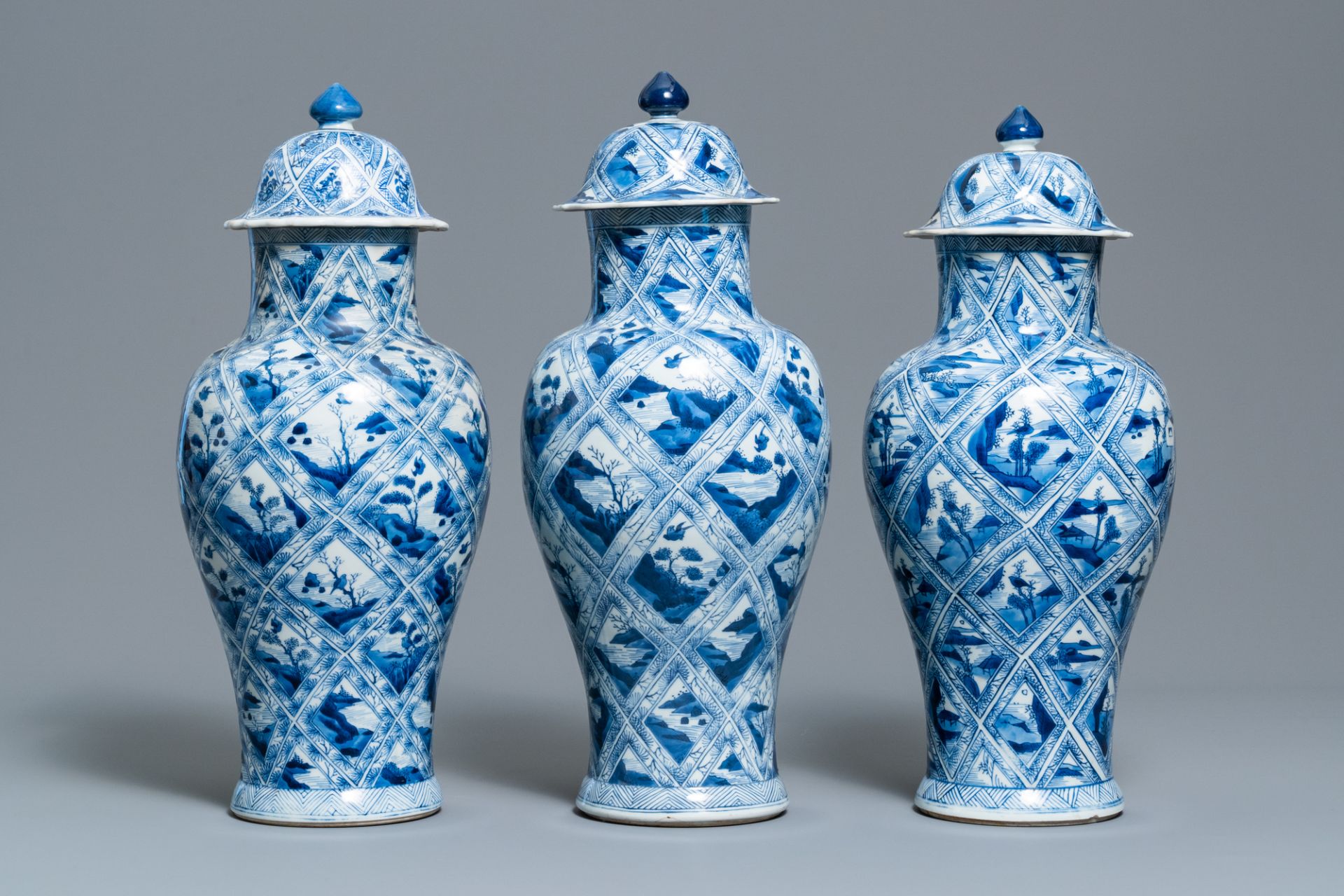 A large Chinese blue and white five-piece garniture with floral and landscape panels, Kangxi - Image 2 of 66