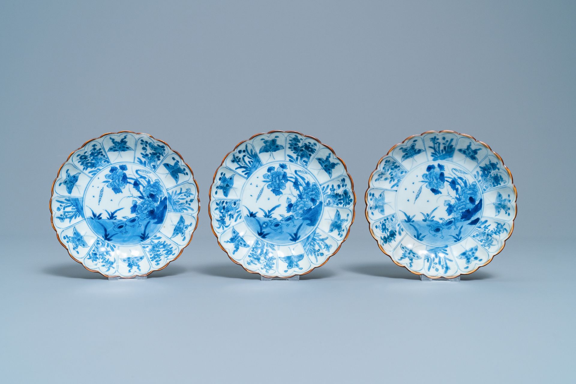 Six Chinese blue and white lobed plates with ducks and butterflies, Kangxi - Image 4 of 11