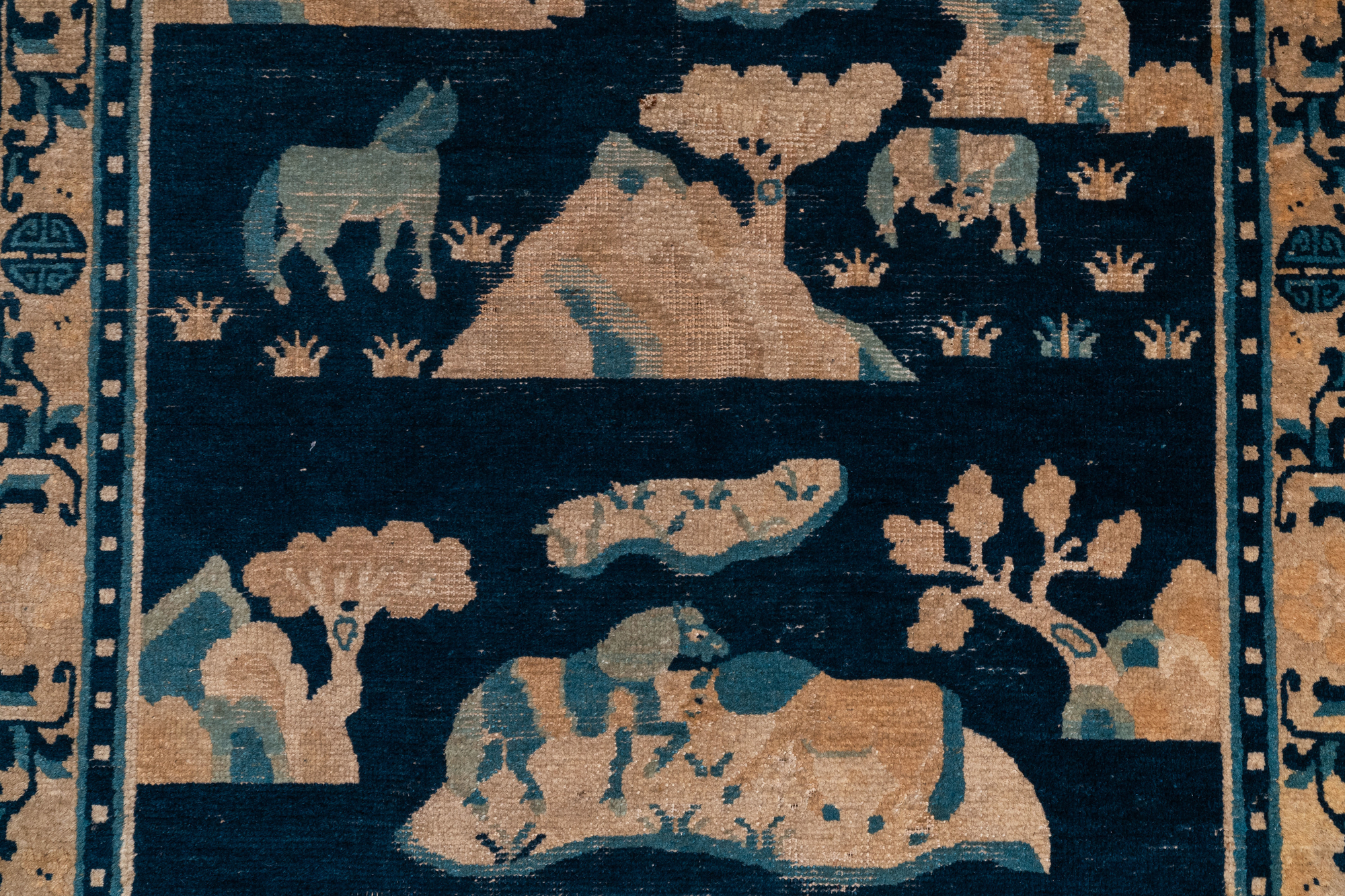 A large Chinese rectangular 'Eight horses of Mu Wang' carpet, 19th C. - Image 5 of 5