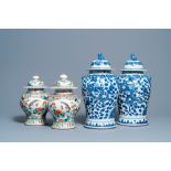 Two pairs of Chinese blue and white and famille verte vases and covers, 19/20th C.