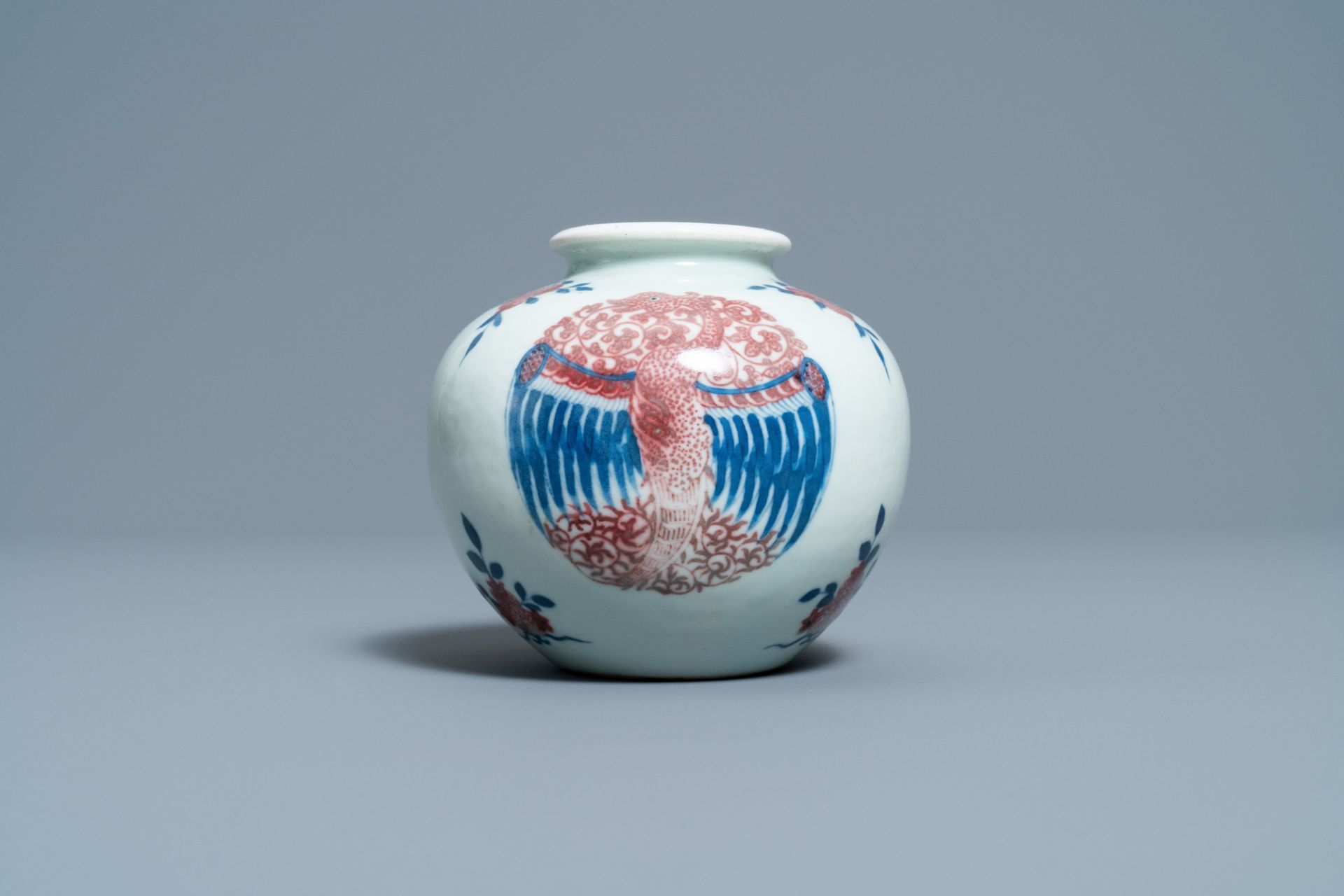 A Chinese blue, white and copper-red 'phoenixes' water pot, Kangxi mark, 19th C. - Image 5 of 7