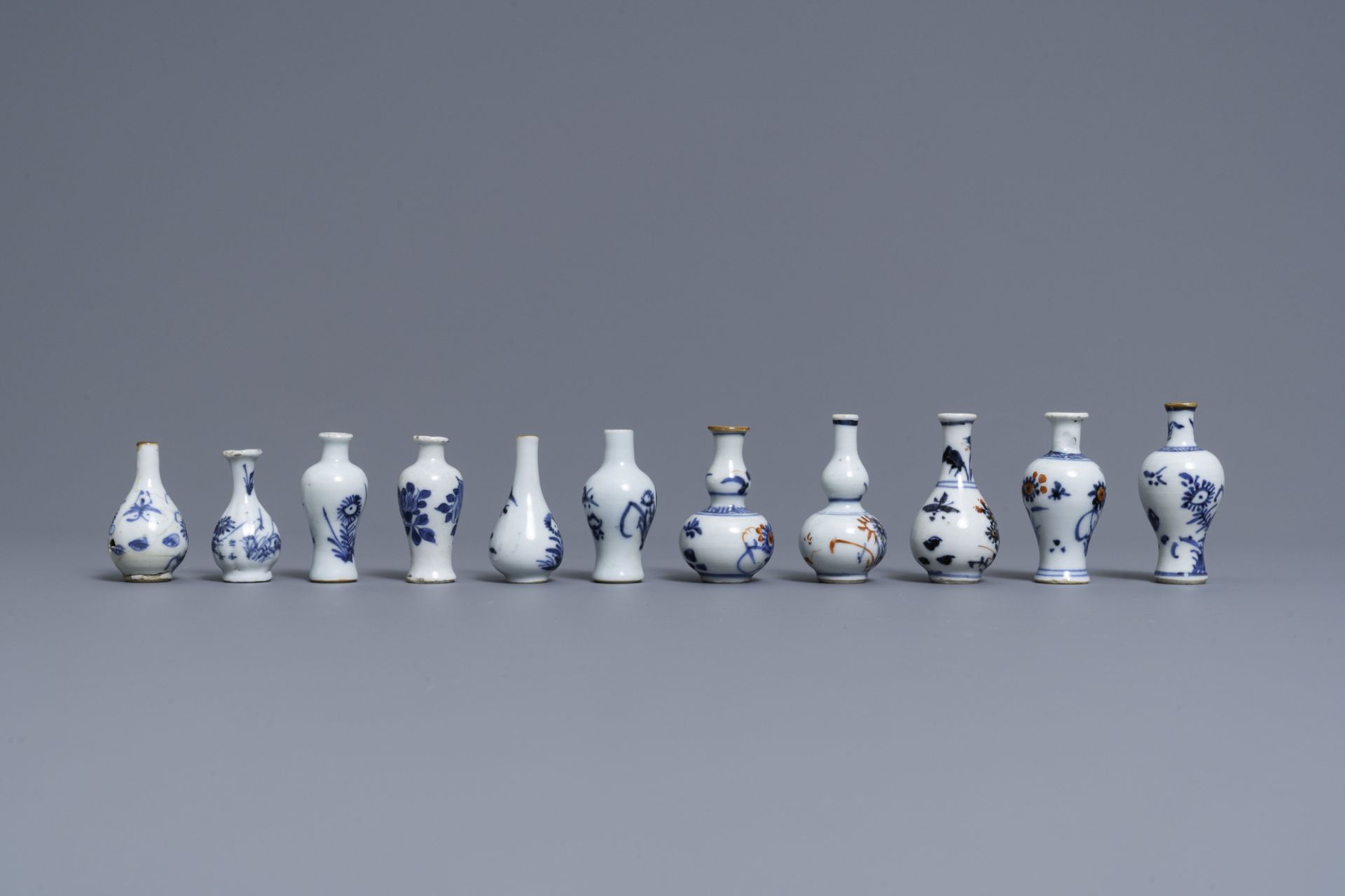 Six Chinese blue and white cups and saucers and eleven miniature vases, Kangxi - Image 3 of 17