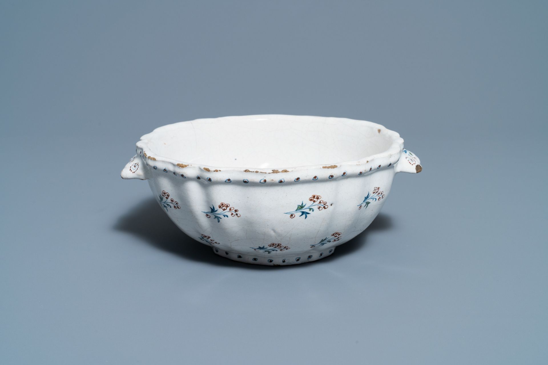 A Brussels faience basin with 'a la haie fleurie' design, 18th C.