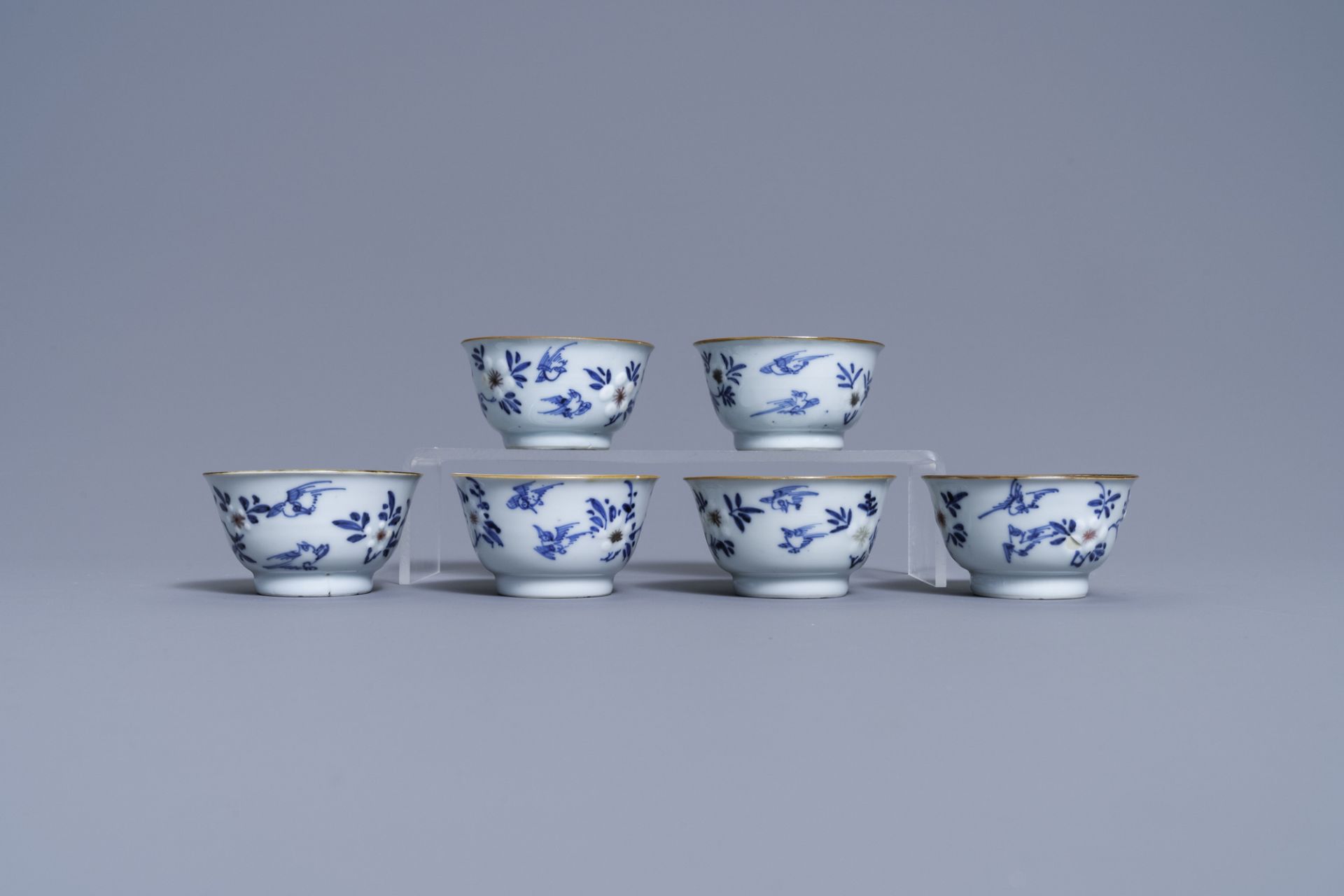 Six Chinese blue, white and copper-red cups and saucers, Kangxi - Image 4 of 9